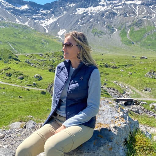 woman with bodywarmer in the mountains